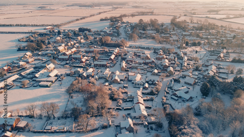snowy village from drone
