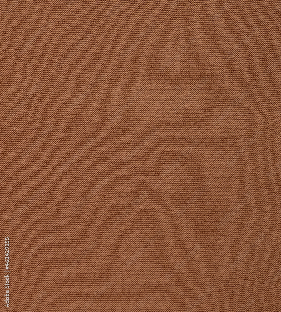 Banner with texture of smooth knitted red brown sweater with pattern. Top view, close-up. Handmade knitting wool or cotton fabric texture. Background of knitting patterns. Banner with texture of smooth knitted red brown sweater with pattern. Top view, close-up. Handmade knitting wool or cotton fabric texture. Background of knitting patterns.