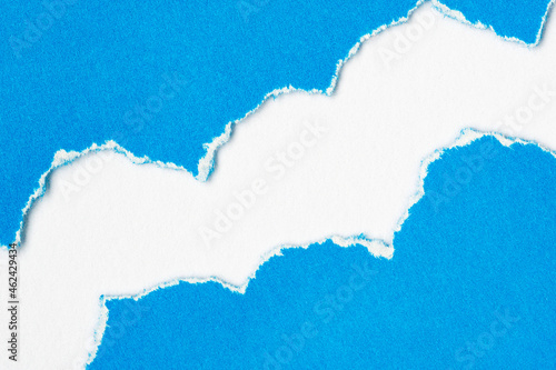 Rip blue paper and white background