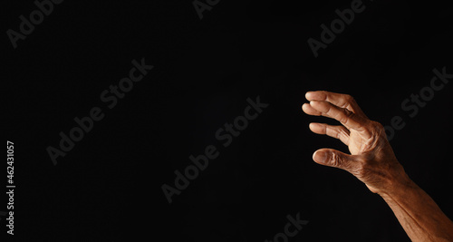 Wrinkled old man's hand