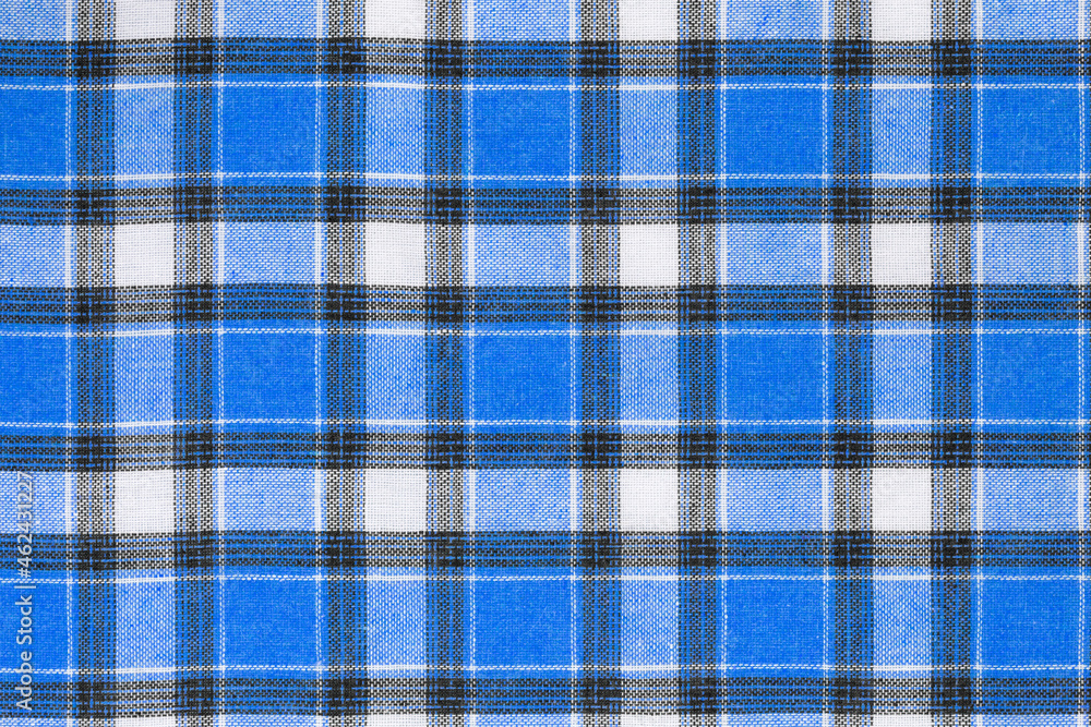 Blue white tartan texture background. shirt fabric with a checkered pattern.  factory material Stock-Foto | Adobe Stock