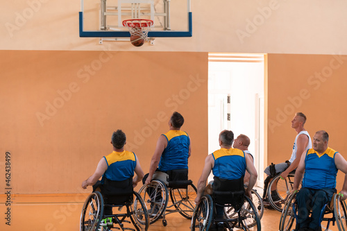 a photo of basketball teams with disabilities with the selector in the big hall before the start of the basketball game © .shock