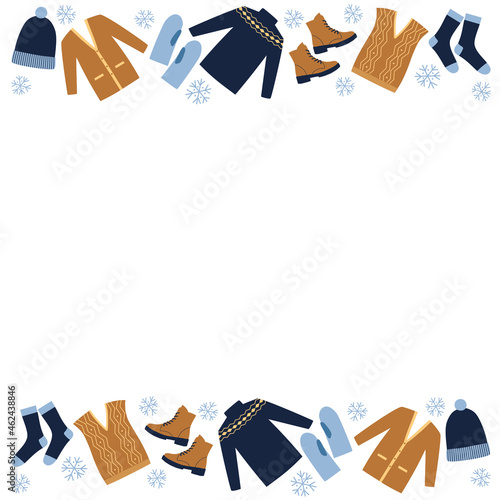 Winter clothes frame. Blue sweater, boots, socks, waistcoat, hat and cardigan on white background. Doodle style. 