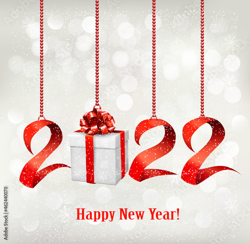 2022 New Year background with gift box and red ribbons. Vector.
