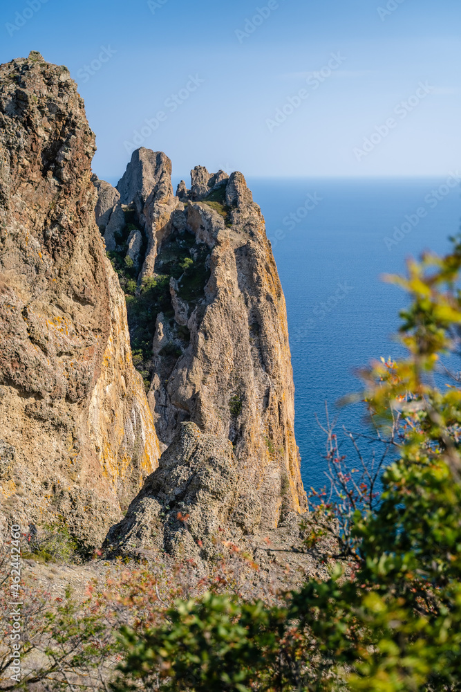 Sheer cliffs near the sea of the volcanic formation Karadag in Koktebel Crimea