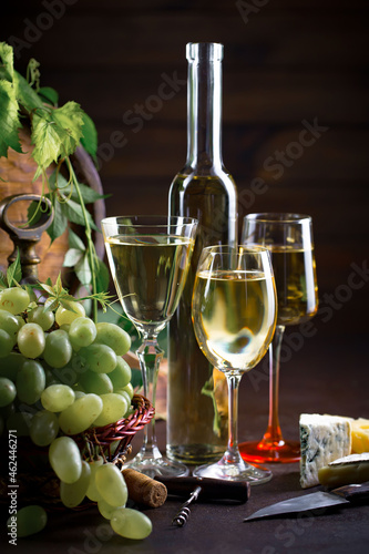 Wine in a glass on an old background