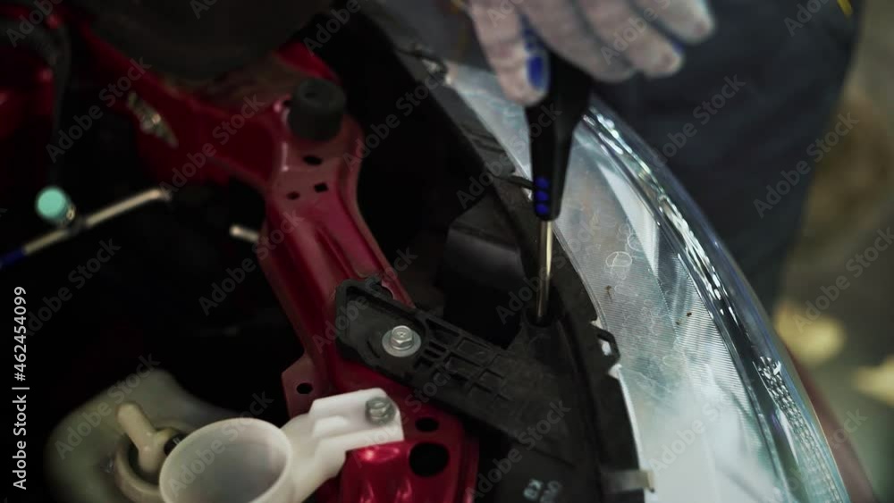 Car service. The car mechanic repairs the car. Car service. The car mechanic repairs the car.