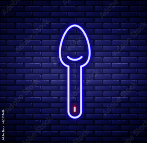 Glowing neon line Spoon icon isolated on brick wall background. Cooking utensil. Cutlery sign. Colorful outline concept. Vector