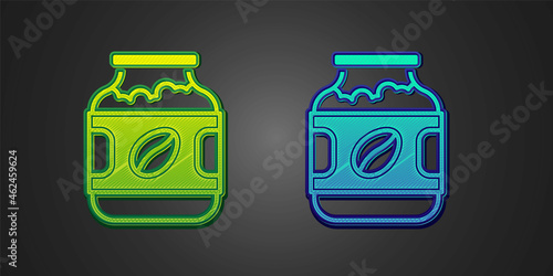 Green and blue Coffee jar bottle icon isolated on black background. Vector