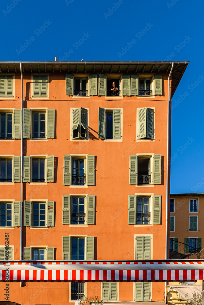 facades of buildings in the historic old town of Nice