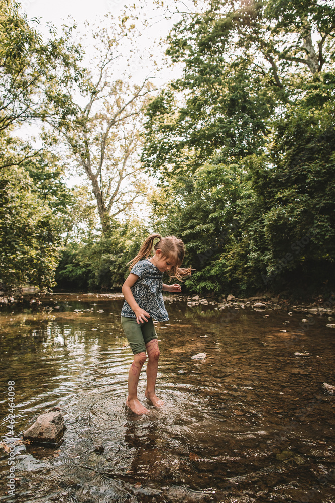 splashing in the creek in the summer splashing in the creek in the summer