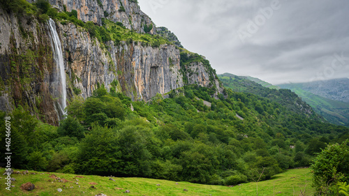Mountainous landscape with waterfall. Source of the Asón river in Cantabria, Spain