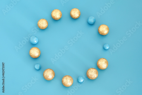 Blue Christmas composition with gold details. Trendy Xmas background  mockup. Modern design. Free space for text  copy space. Flat lay  top view.