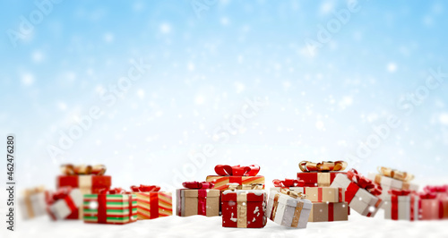 Christmas gifts on snow out...