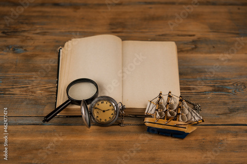 Old vintage books and a watch