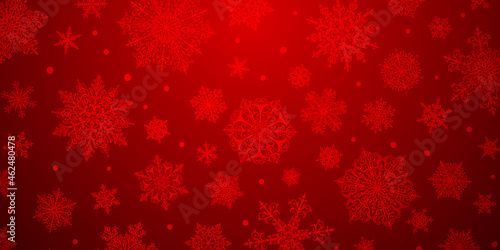 Christmas background of big and small complex snowflakes in red colors