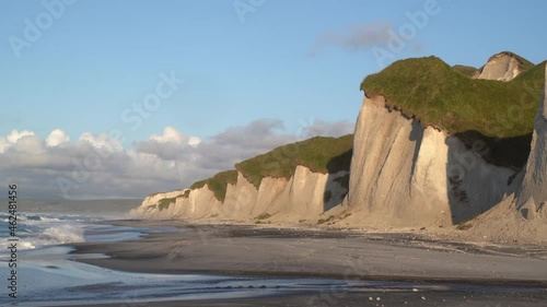 Russia, Kuril Islands, Iturup Island, White rocks on coast of the Sea of Okhotsk.