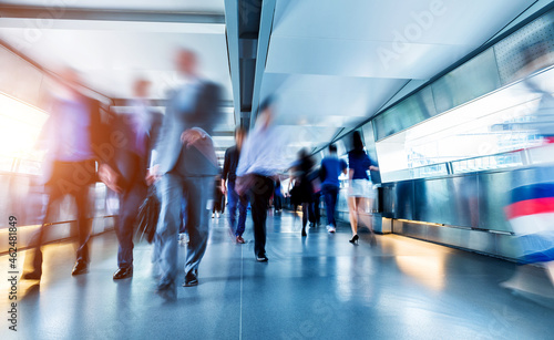 Business people rushing in the lobby