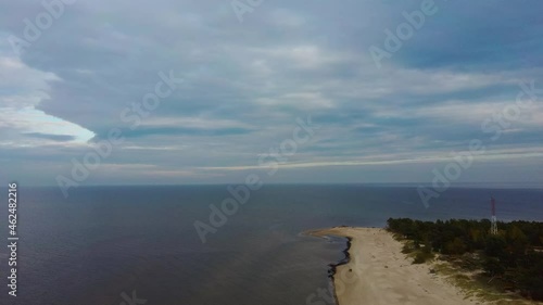 Aerial View Over the Kolka Cape, Baltic Sea, Latvia. During Autumn Evening Sunset. Kolka Horn Divides Baltic Sea and Riga Bay. photo