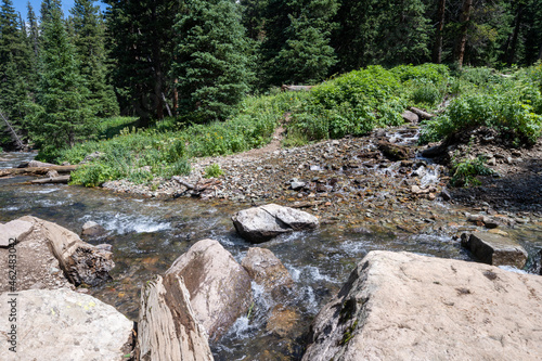 Small river creek water crossing along the Blue Lakes Trail in the San Juan Mountains of Colorado