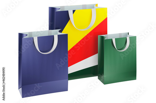 Shopping bags with Seychelloise flag. Shopping in Seychelles, concept. 3D rendering