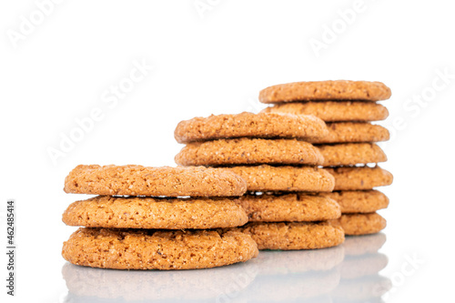 Several fresh oatmeal cookies, close-up, isolated on white.
