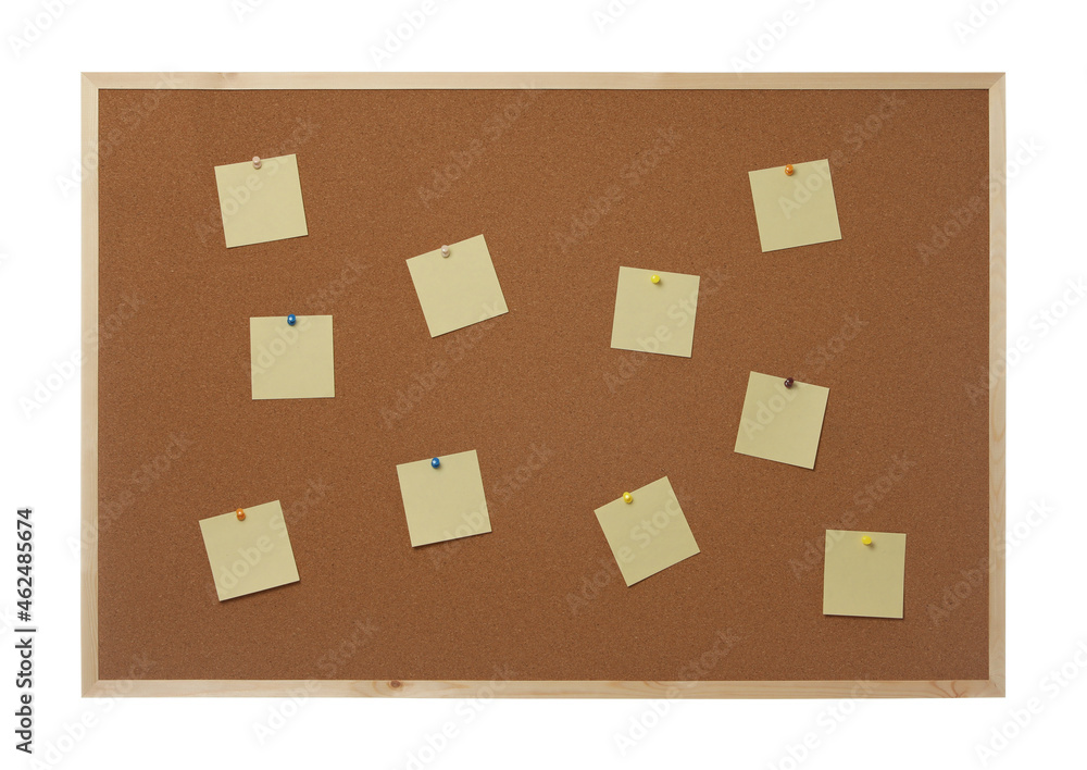 Empty notes pinned to cork board on white background Empty notes pinned to cork board on white background
