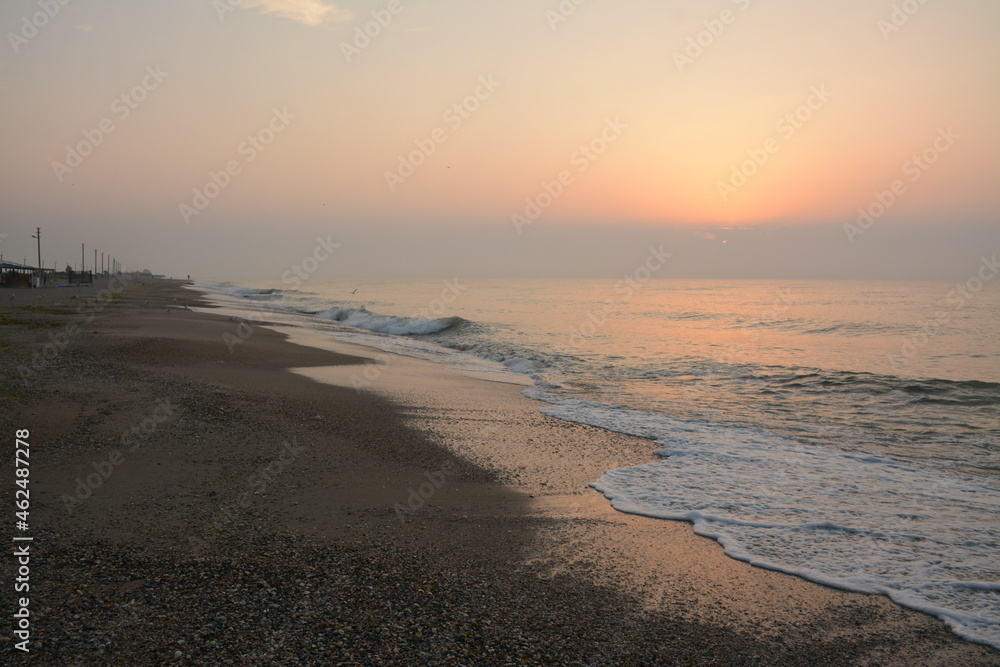 Sunrise over the clouds at sea after a storm. Black sea, Odessa region, Ukraine