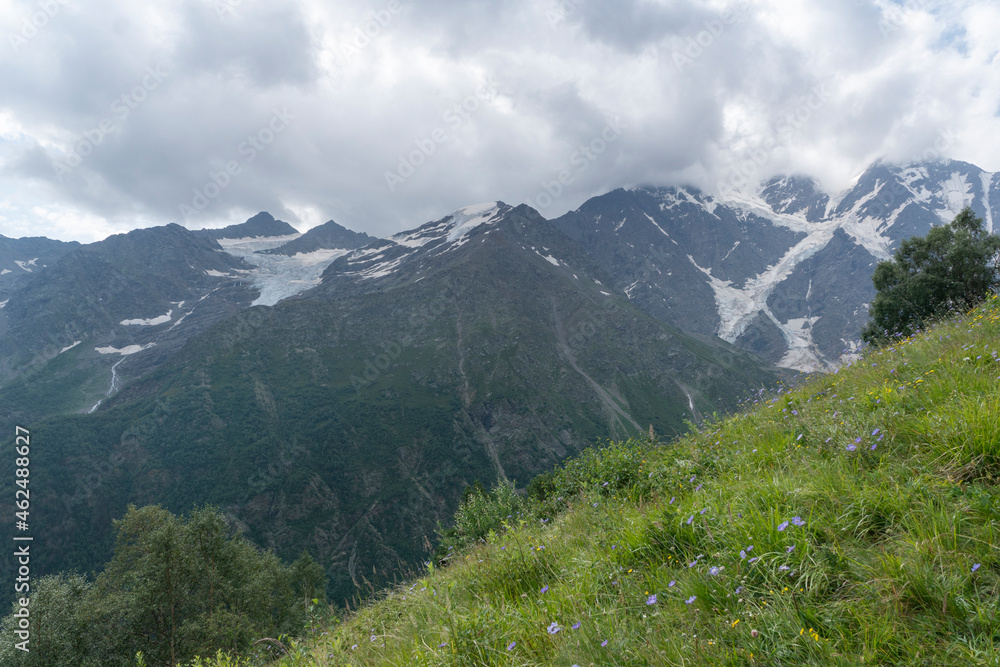 Fantastic view of high Caucasus mountains with glaicers. Beautiful landscape, copy space.