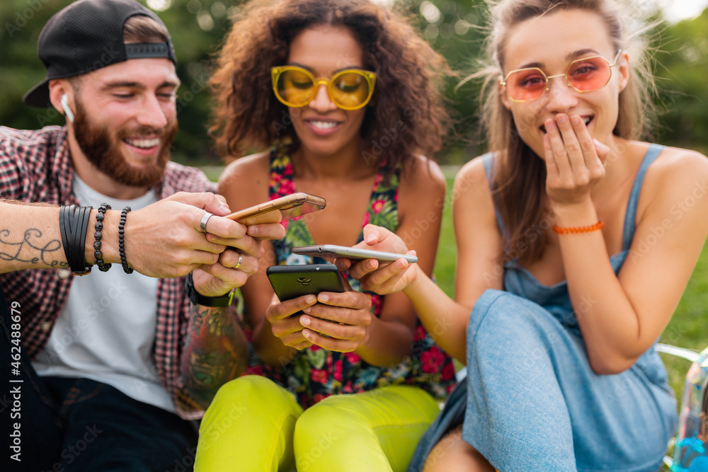 happy young company of friends sitting park happy young company of friends sitting park