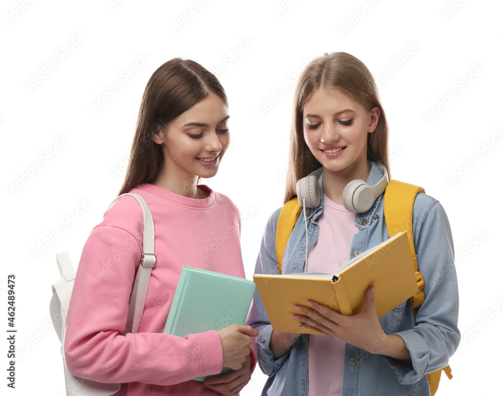 Teenage students with books and backpacks on white background Teenage students with books and backpacks on white background