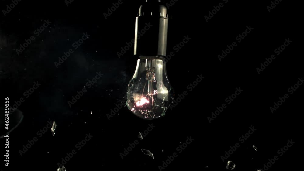 Super slow motion light bulb breaks into rattles. On a black background. Filmed on a high-speed camera at 1000 fps.High quality FullHD footage Super slow motion light bulb breaks into rattles. On a black background. Filmed on a high-speed camera at 1000 fps.High quality FullHD footage