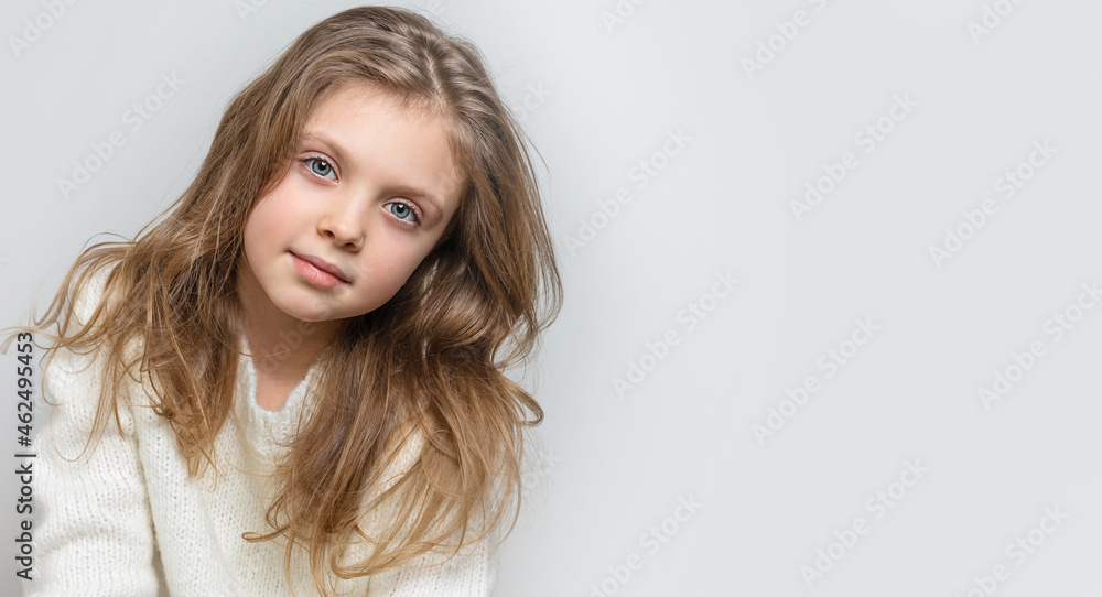 Portrait of beautiful happy smiling baby girl on a white background, banner. Copy space for text Portrait of beautiful happy smiling baby girl on a white background, banner. Copy space for text