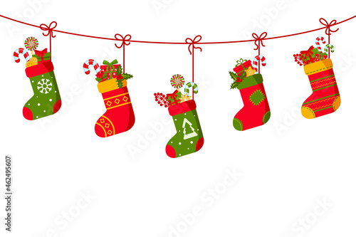 Christmas socks with gifts hanging on garland. Greeting card, frame for Christmas, New Year. Winter Holiday Decoration. Traditional Christians symbol. Bright Vector illustration on white background