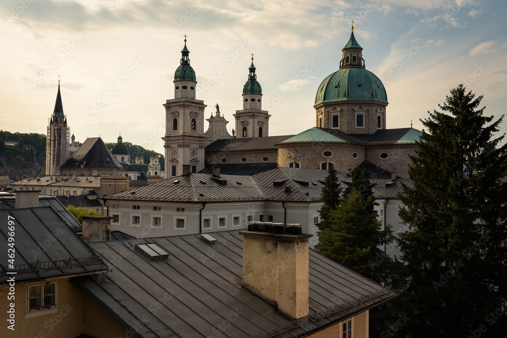 Skyline of Salzburg city with Cathedral in summer on a cloudy day at sunset, Austria