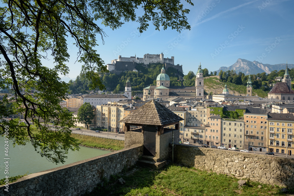 View of Salzburg, the river Salzach and the mountains from the old Kapuzinerberg wall on a sunny summer day, Austria View of Salzburg, the river Salzach and the mountains from the old Kapuzinerberg wall on a sunny summer day, Austria