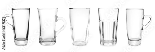 Set with different empty glass coffee cups on white background. Banner design
