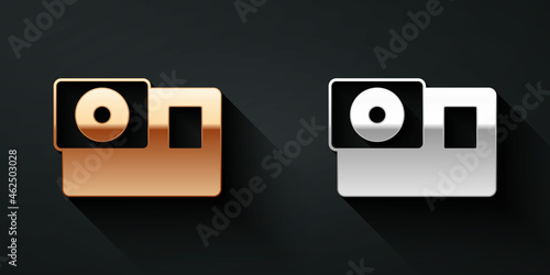 Gold and silver Action extreme camera icon isolated on black background. Video camera equipment for filming extreme sports. Long shadow style. Vector