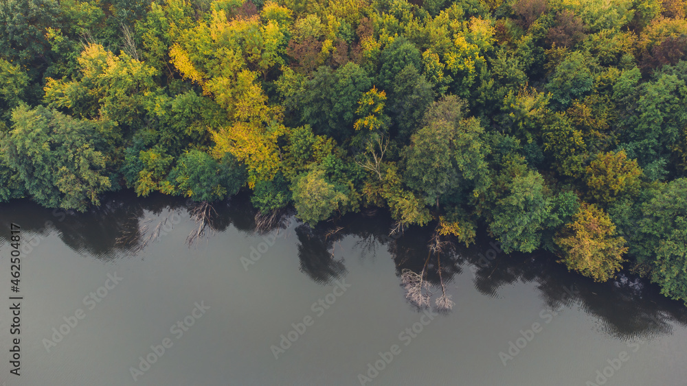 Aerial view of two lake and autumn forests on morning. Place for fishing Aerial view of two lake and autumn forests on morning. Place for fishing