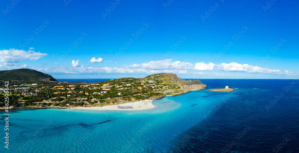 View from above, aerial shot, stunning panoramic view of La Pelosa Beach bathed by a turquoise, crystal clear water. Spiaggia La Pelosa, Stintino, north-west Sardinia, Italy.