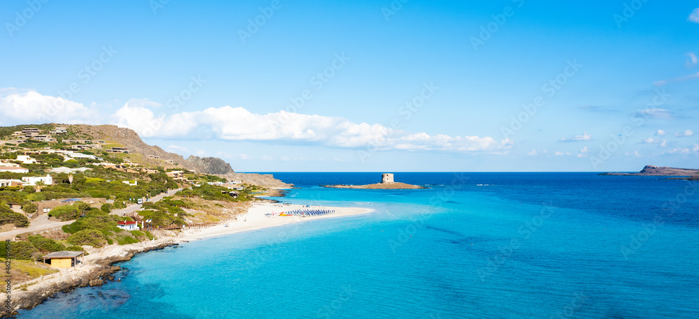 View from above, stunning aerial aerial view of La Pelosa Beach bathed by a turquoise, crystal clear water. Spiaggia La Pelosa, Stintino, north-west Sardinia, Italy.
