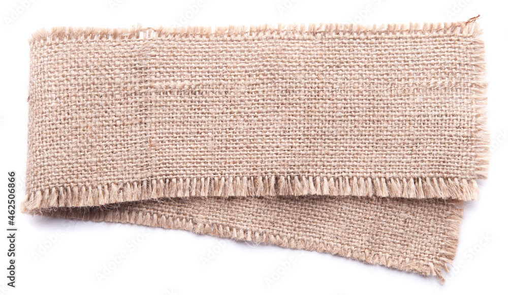 A piece of burlap folded in half. isolated on white background. A piece of burlap folded in half. isolated on white background.