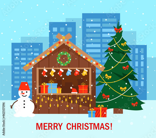 Christmas tree and Market stall or wooden kiosk in city.