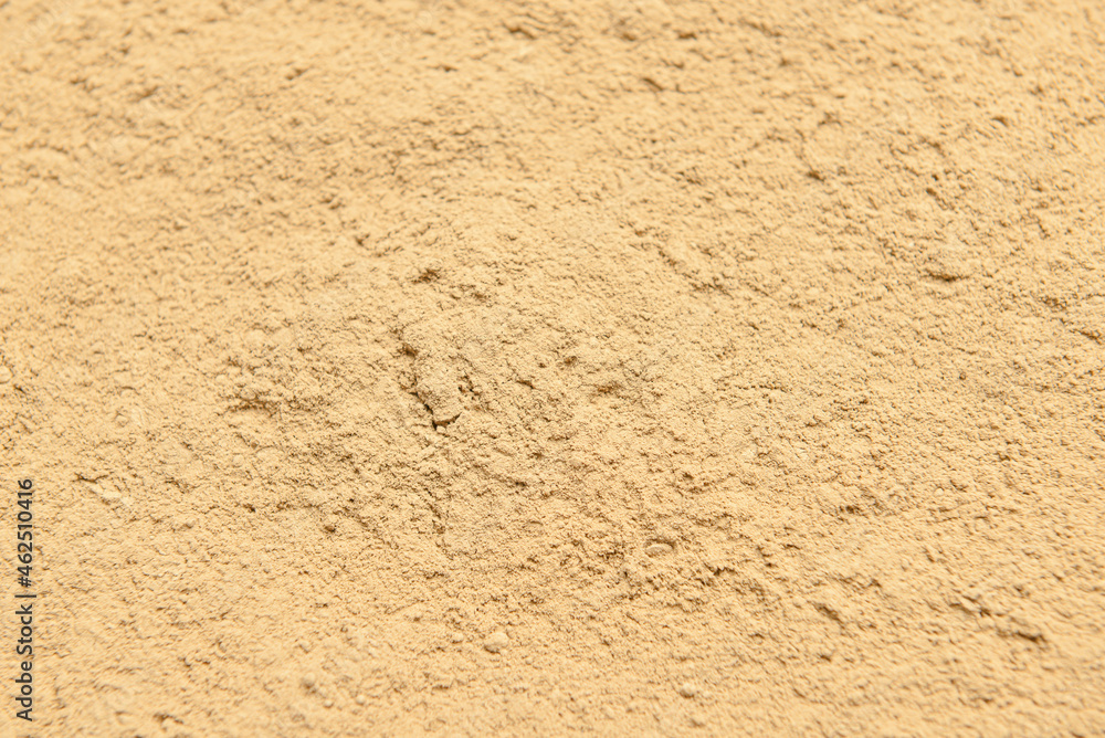 Natural hojicha powder as background Natural hojicha powder as background