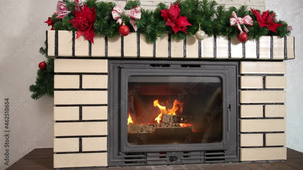 Christmas interior room fireplace, gifts. Rustic yuletide decorations garlands Christmas interior room fireplace, gifts. Rustic yuletide decorations garlands