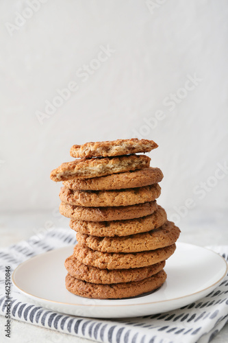 Plate with tasty hojicha cookies on white background