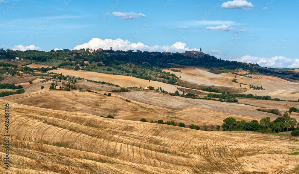 Tuscany, Italy. August 2020. Amazing landscape of the Tuscan countryside with the typical rolling hills and cypresses to mark the boundaries.