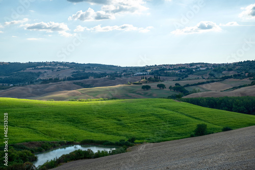 Tuscany, Italy. August 2020. Amazing landscape of the Tuscan countryside with the typical rolling hills and cypresses to mark the boundaries.