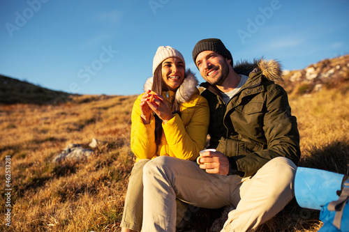 Couple enjoying in nature on hike trip
