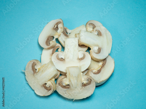 a slice of champignons on a blue background